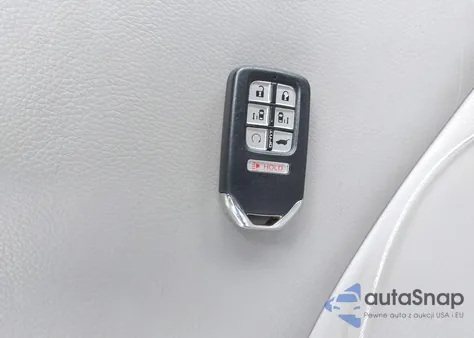 2021 Honda Odyssey Exl z USA, uszkodzony, nr VIN 5FNRL6H70MB025099